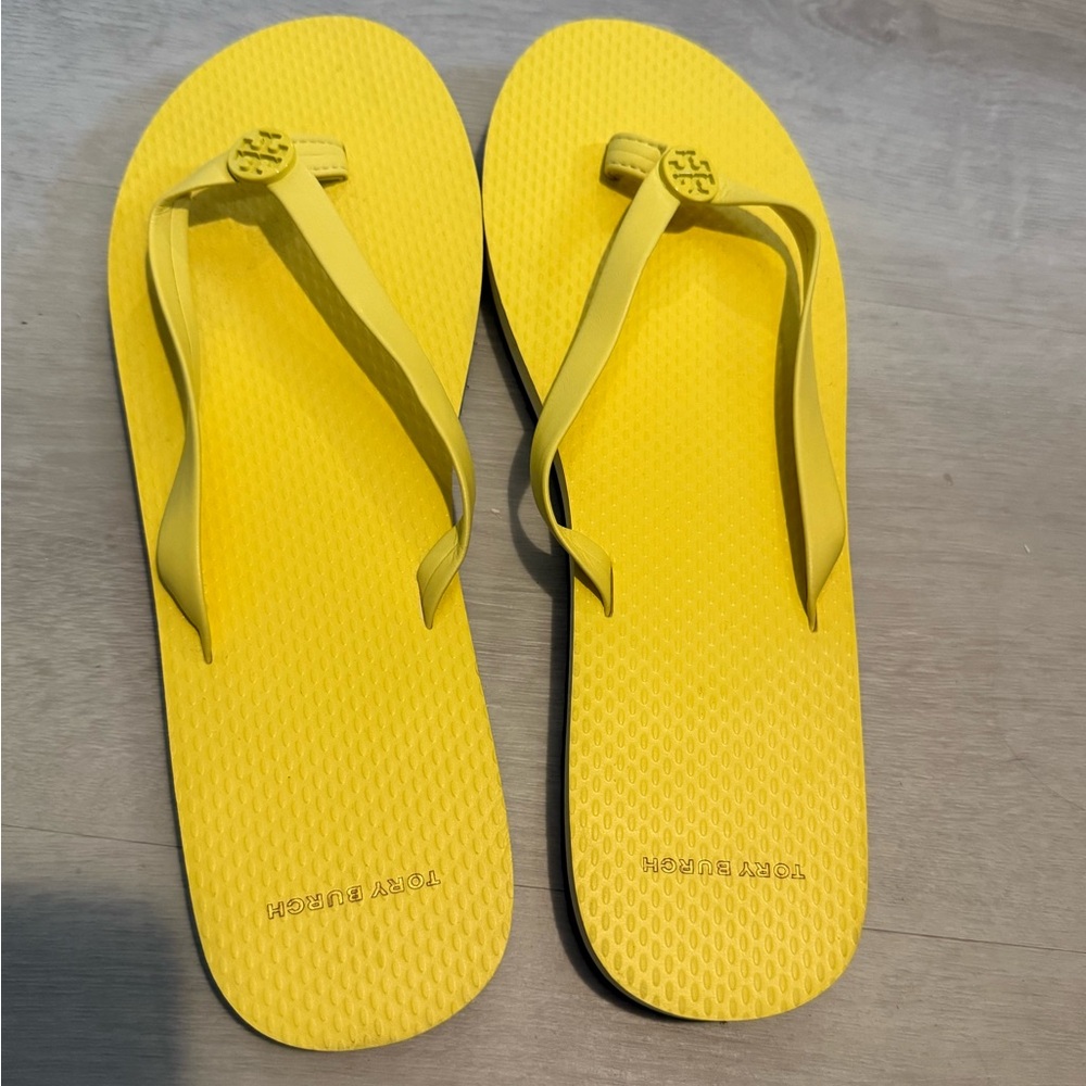 Tory Burch flip flops. Never worn size 11